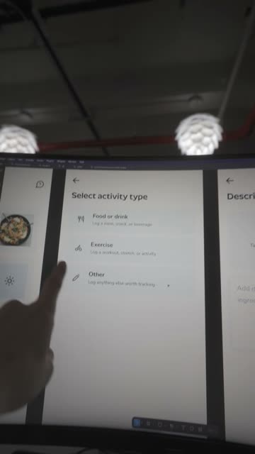 GoutBuddy screens in Figma on a monitor.